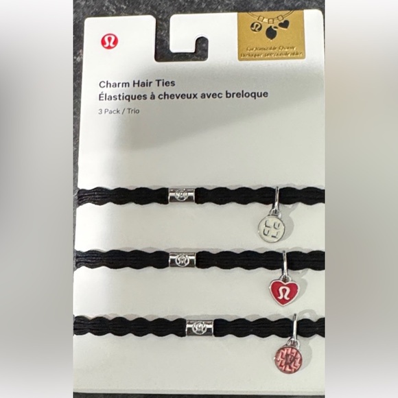 Lululemon Accessories - Lululemon hair ties 3 pack with Lulu charms NWT